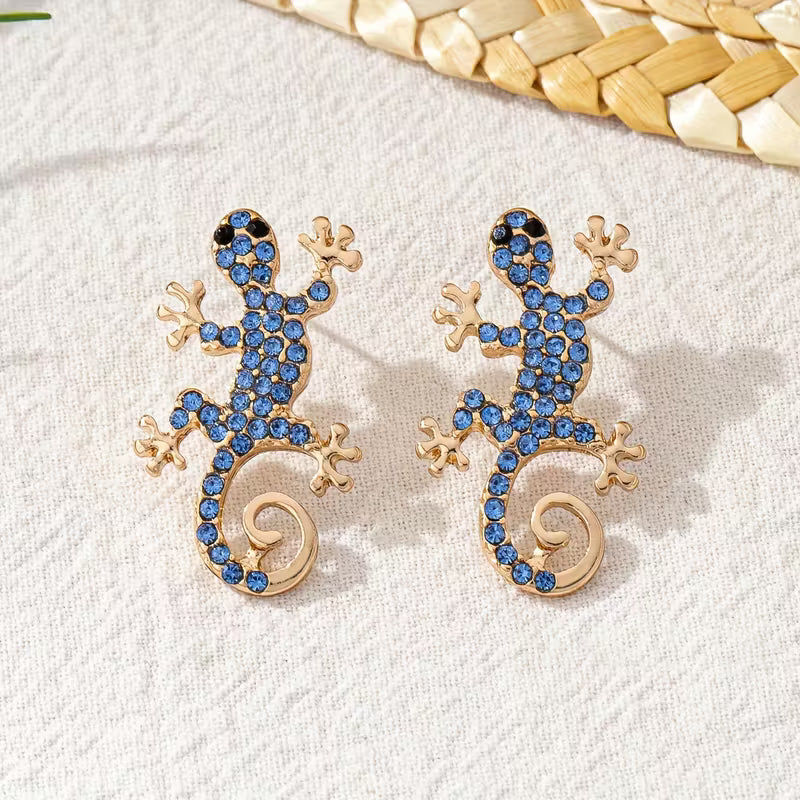Gecko-korvakorut onnenamuletin kanssa – ilmainen sormus | Rajoitettu tarjous