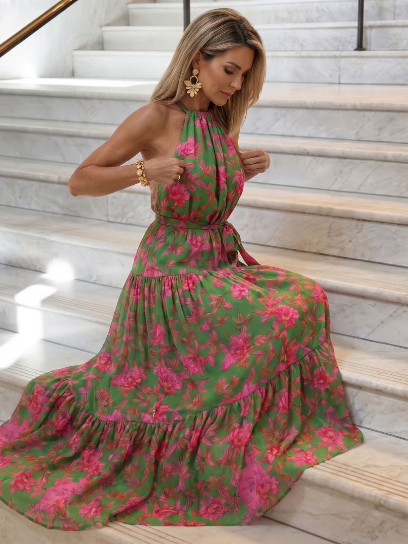 Elegantti vaaleanpunainen midi-mekko, jossa on halterneck-olkaimet