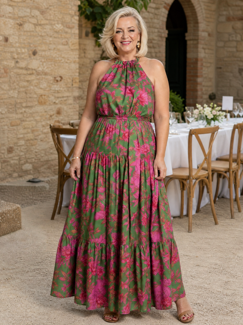 Elegantti vaaleanpunainen midi-mekko, jossa on halterneck-olkaimet